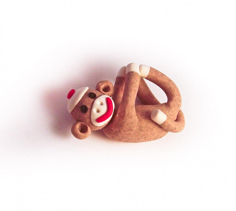 Brown Sock Monkey Pendant Swinging from all fours handmade in Polymer Clay 